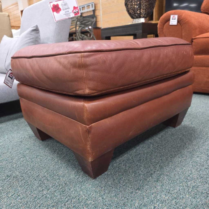 LEATHER OTTOMAN AT