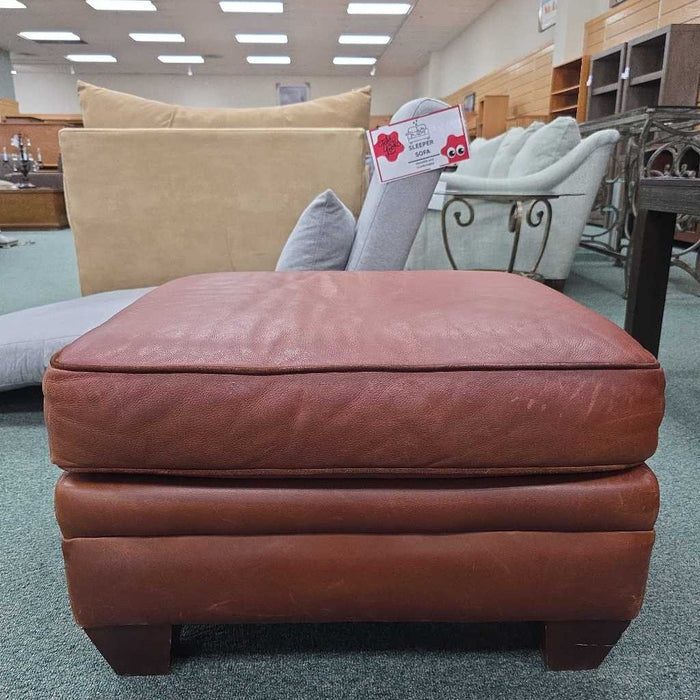 LEATHER OTTOMAN AT