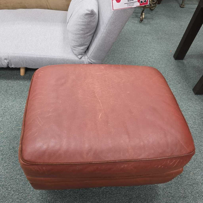 LEATHER OTTOMAN AT