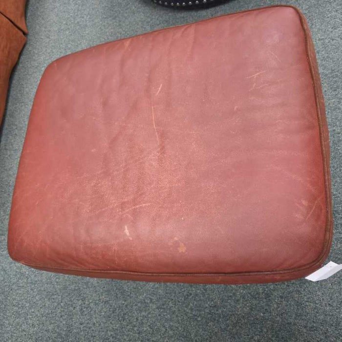LEATHER OTTOMAN AT