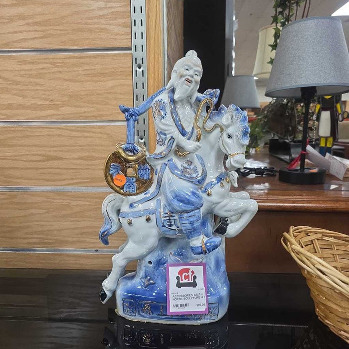 ASIAN HORSE SCULPTURE AT