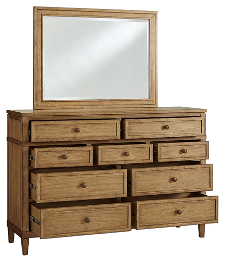 Sharlance California King Upholstered Panel Bed with Mirrored Dresser, Chest and Nightstand