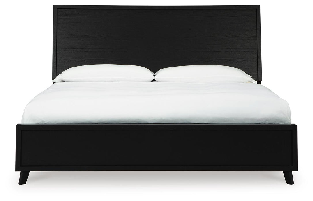 Danziar King Panel Bed with Mirrored Dresser